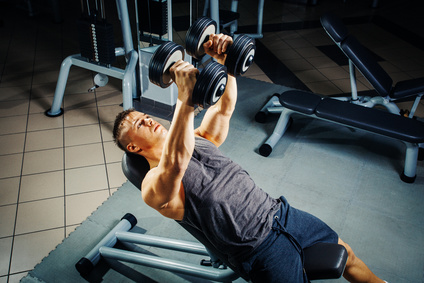 Man Performing Incline Dumbbell Flyes